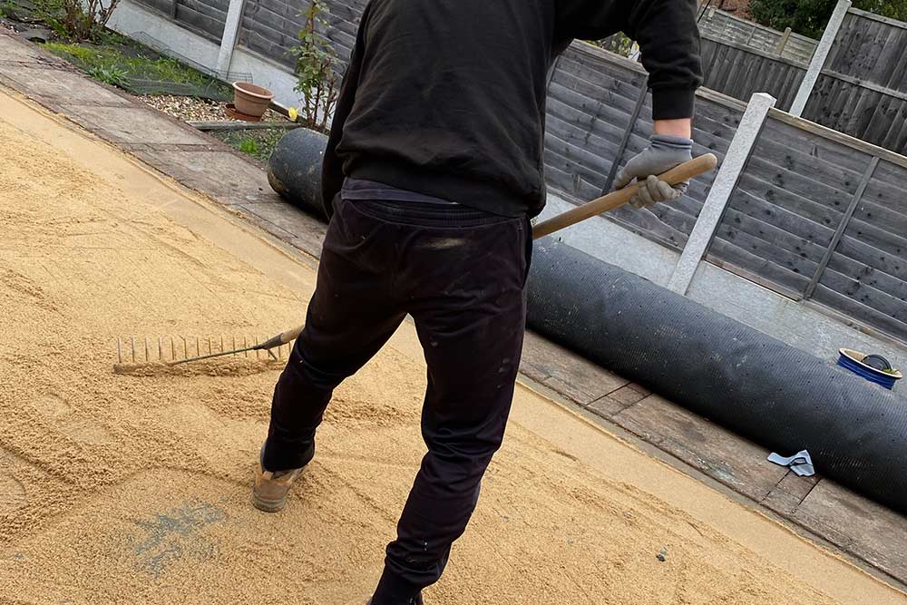 New Lawn staff placing building layer